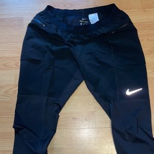 Nike Workout Pants with zips at bottom.